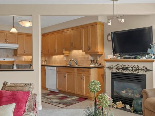 213-350 Island Hwy South, Campbell River, BC - Indoor Photo Showing Living Room With Fireplace