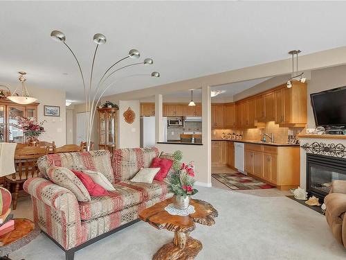 213-350 Island Hwy South, Campbell River, BC - Indoor Photo Showing Living Room With Fireplace