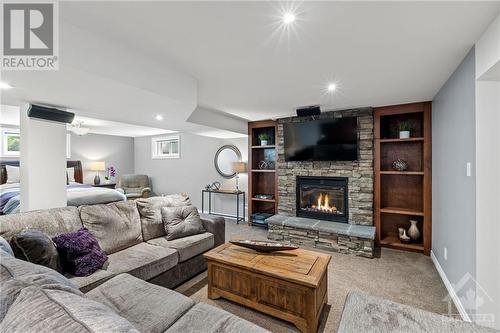 7344 Blue Water Crescent, Ottawa, ON - Indoor Photo Showing Living Room With Fireplace