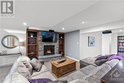 7344 Blue Water Crescent, Ottawa, ON - Indoor Photo Showing Living Room With Fireplace