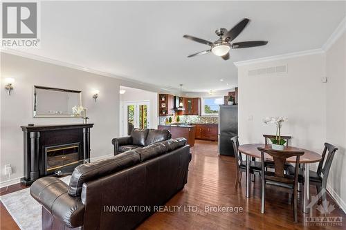 7344 Blue Water Crescent, Ottawa, ON - Indoor Photo Showing Living Room With Fireplace