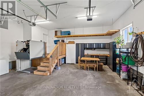 7344 Blue Water Crescent, Ottawa, ON - Indoor Photo Showing Garage