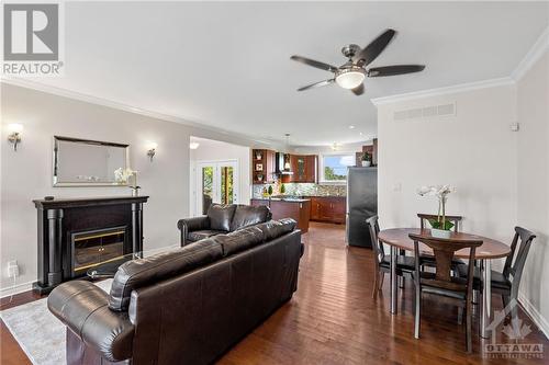 7344 Blue Water Crescent, Ottawa, ON - Indoor Photo Showing Living Room With Fireplace