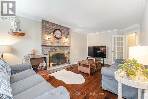 1438 Winterbourne Drive, Oakville (Clearview), ON - Indoor Photo Showing Living Room With Fireplace