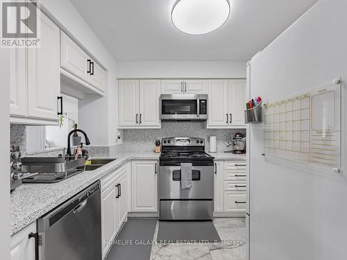 2239 - 68 Corporate Drive, Toronto (Woburn), ON - Indoor Photo Showing Kitchen With Stainless Steel Kitchen With Double Sink