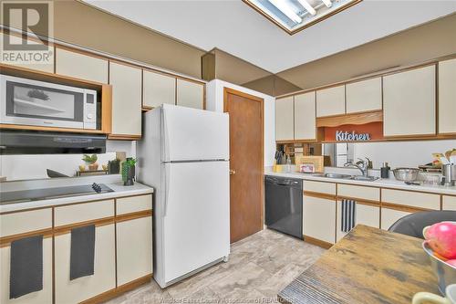 2211 Moy Avenue, Windsor, ON - Indoor Photo Showing Kitchen With Double Sink