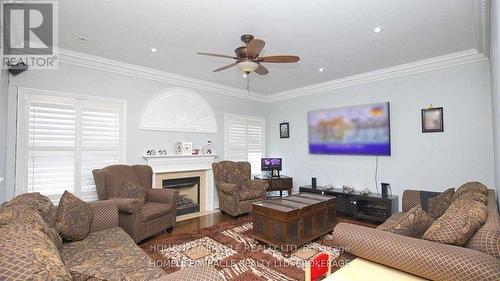 38 Eiffel Boulevard, Brampton (Vales Of Castlemore), ON - Indoor Photo Showing Living Room With Fireplace