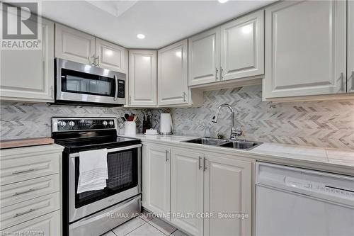 503 - 1201 North Shore Boulevard E, Burlington, ON - Indoor Photo Showing Kitchen With Double Sink With Upgraded Kitchen