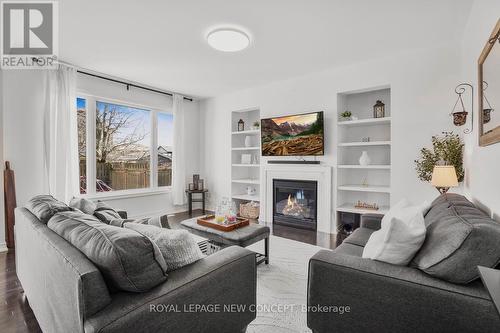 6422 Dilalla Crescent, Niagara Falls, ON - Indoor Photo Showing Living Room With Fireplace