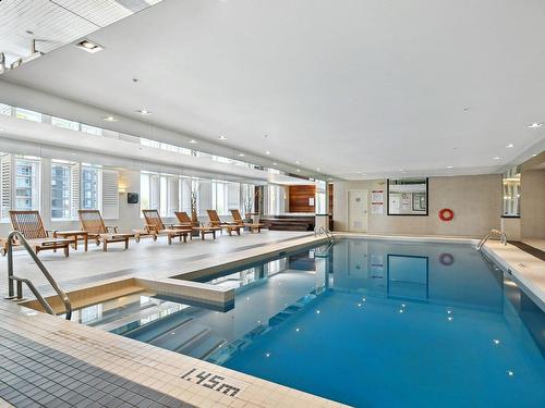 Piscine - 108-2160 Av. Terry-Fox, Laval (Chomedey), QC - Indoor Photo Showing Other Room With In Ground Pool