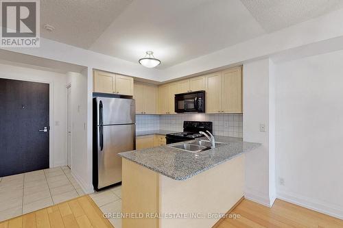 1010 - 55 De Boers Drive, Toronto (York University Heights), ON - Indoor Photo Showing Kitchen With Double Sink