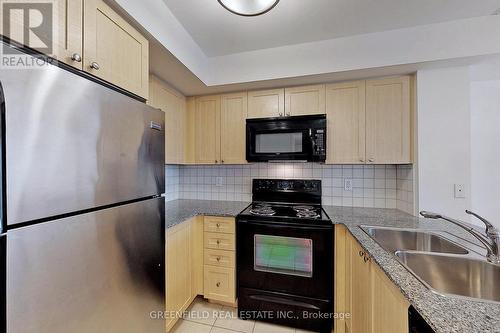 1010 - 55 De Boers Drive, Toronto (York University Heights), ON - Indoor Photo Showing Kitchen With Double Sink