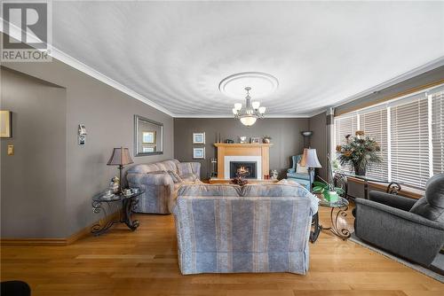 375 Cote, Chelmsford, ON - Indoor Photo Showing Living Room With Fireplace