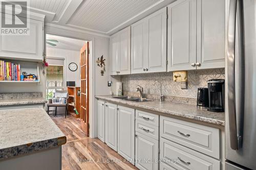 357 Southam Drive, Kawartha Lakes, ON - Indoor Photo Showing Kitchen With Double Sink