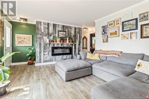 69 Acadie Street, Saint-Antoine, NB - Indoor Photo Showing Living Room With Fireplace