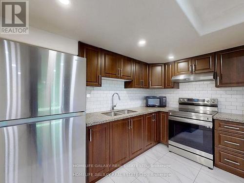 27 Neelands Crescent, Toronto (Morningside), ON - Indoor Photo Showing Kitchen With Double Sink