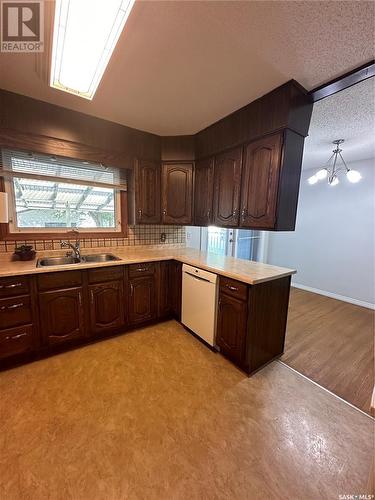 326 U Avenue N, Saskatoon, SK - Indoor Photo Showing Kitchen With Double Sink