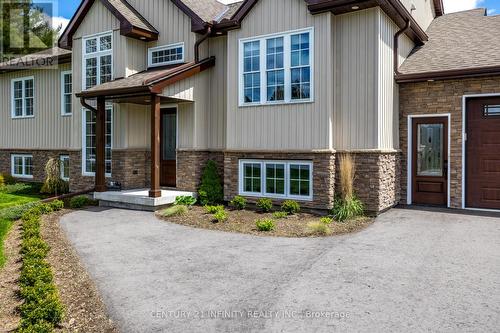 240 Burnt River Drive, Kawartha Lakes (Burnt River), ON - Outdoor With Facade