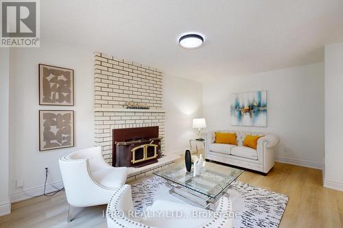 46 Calverley Trail, Toronto (Highland Creek), ON - Indoor Photo Showing Living Room With Fireplace