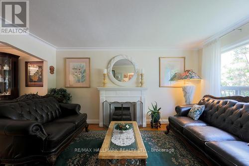 77 Mcintosh Street, Toronto (Birchcliffe-Cliffside), ON - Indoor Photo Showing Living Room With Fireplace