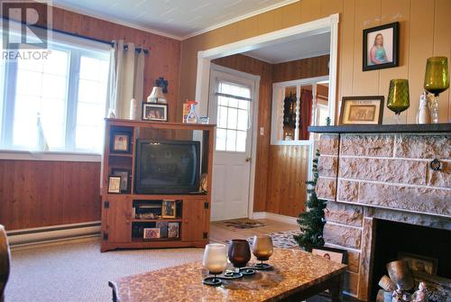 442 Southside Road, Harbour Grace, NL - Indoor Photo Showing Other Room With Fireplace