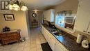 22 Romains Road, Port Au Port East, NL  - Indoor Photo Showing Kitchen With Double Sink 