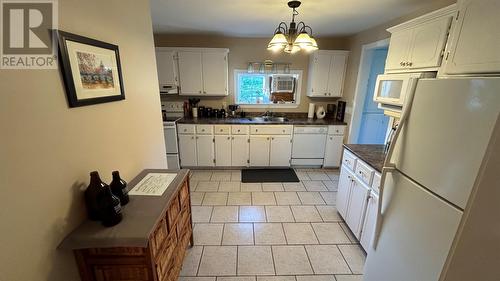 22 Romains Road, Port Au Port East, NL - Indoor Photo Showing Kitchen With Double Sink