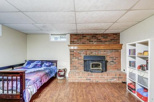 2438 Malcolm Crescent, Burlington, ON - Indoor Photo Showing Bedroom With Fireplace