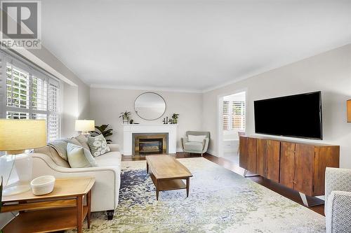 1171 St Anthony Road, London, ON - Indoor Photo Showing Living Room With Fireplace