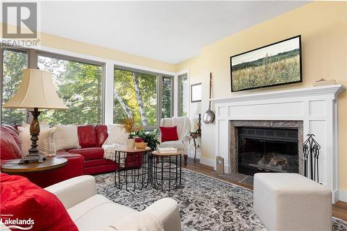 321 Grandview Hilltop Drive Unit# 3, Huntsville, ON - Indoor Photo Showing Living Room With Fireplace