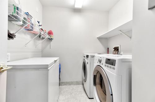 310-1966 Enterprise Way, Kelowna, BC - Indoor Photo Showing Laundry Room