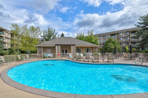 310-1966 Enterprise Way, Kelowna, BC - Outdoor With In Ground Pool With Backyard