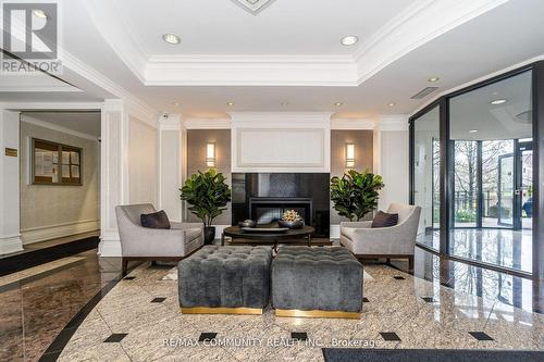 718 - 16 Dallimore Circle, Toronto (Banbury-Don Mills), ON - Indoor With Fireplace