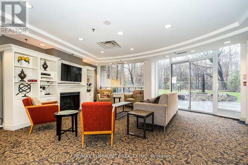 718 - 16 Dallimore Circle, Toronto (Banbury-Don Mills), ON - Indoor With Fireplace