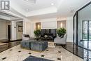 718 - 16 Dallimore Circle, Toronto (Banbury-Don Mills), ON  - Indoor With Fireplace 