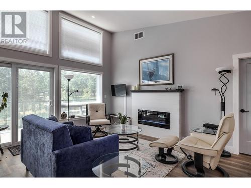 36 Spruce Drive, Vernon, BC - Indoor Photo Showing Living Room With Fireplace