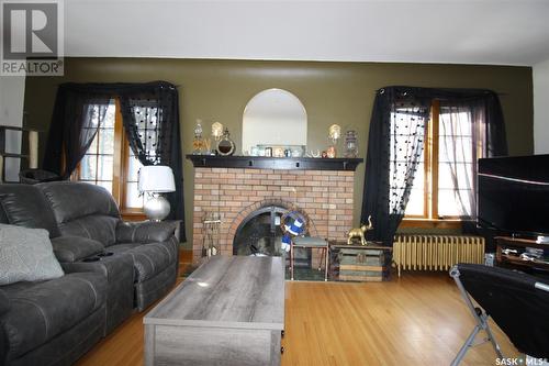 215 7Th Avenue E, Shaunavon, SK - Indoor Photo Showing Living Room With Fireplace