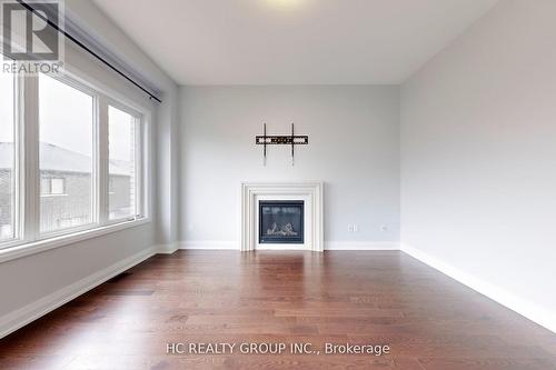 10 Periwinkle Road, Springwater (Midhurst), ON - Indoor Photo Showing Living Room With Fireplace