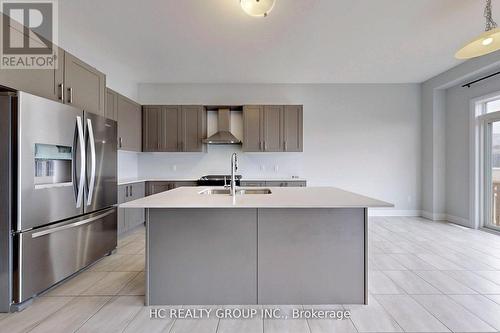 10 Periwinkle Road, Springwater (Midhurst), ON - Indoor Photo Showing Kitchen With Stainless Steel Kitchen With Double Sink