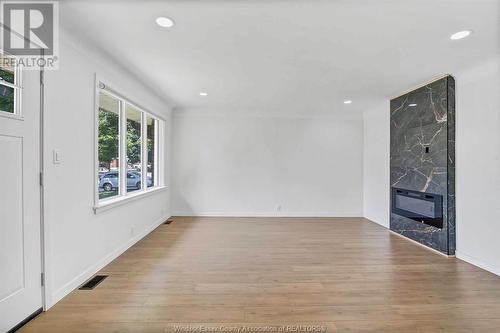 3859 Birch Street, Windsor, ON - Indoor Photo Showing Other Room With Fireplace