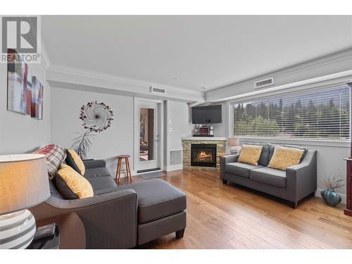 330 4 Avenue Se Unit# 306, Salmon Arm, BC - Indoor Photo Showing Living Room With Fireplace