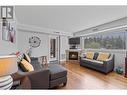 330 4 Avenue Se Unit# 306, Salmon Arm, BC  - Indoor Photo Showing Living Room With Fireplace 