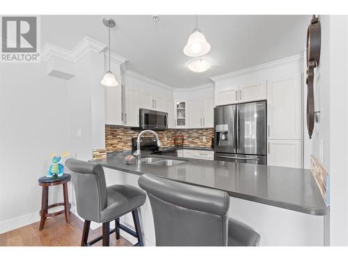 330 4 Avenue Se Unit# 306, Salmon Arm, BC - Indoor Photo Showing Kitchen With Stainless Steel Kitchen With Double Sink