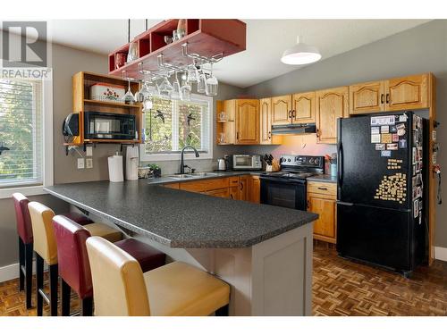 3990 Eastwood Drive, Kelowna, BC - Indoor Photo Showing Kitchen With Double Sink