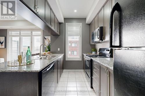 312 - 54 Sky Harbour Drive, Brampton, ON - Indoor Photo Showing Kitchen With Double Sink