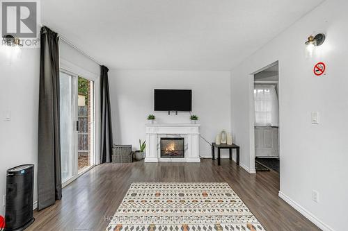 1180 Heathfield Court, Windsor, ON - Indoor Photo Showing Living Room With Fireplace