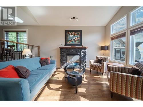 831 309Th  Street, Cranbrook, BC - Indoor Photo Showing Living Room With Fireplace