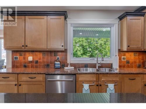 831 309Th  Street, Cranbrook, BC - Indoor Photo Showing Kitchen With Double Sink