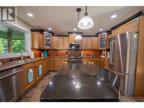 831 309Th  Street, Cranbrook, BC - Indoor Photo Showing Kitchen With Double Sink