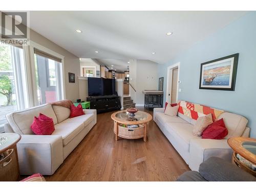 831 309Th  Street, Cranbrook, BC - Indoor Photo Showing Living Room With Fireplace